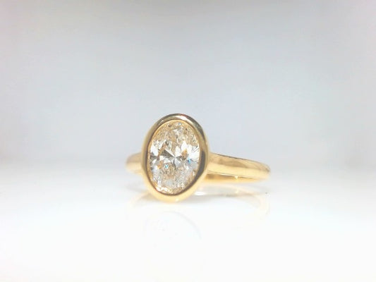 Lady's Yellow 10 Karat Bezel Engagement Ring 1.01Ct Oval Lab Diamond