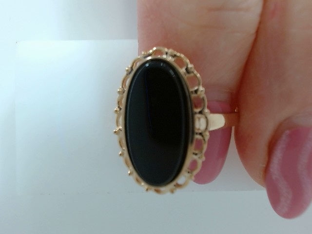 Lady's Yellow 10 Karat Onyx Co