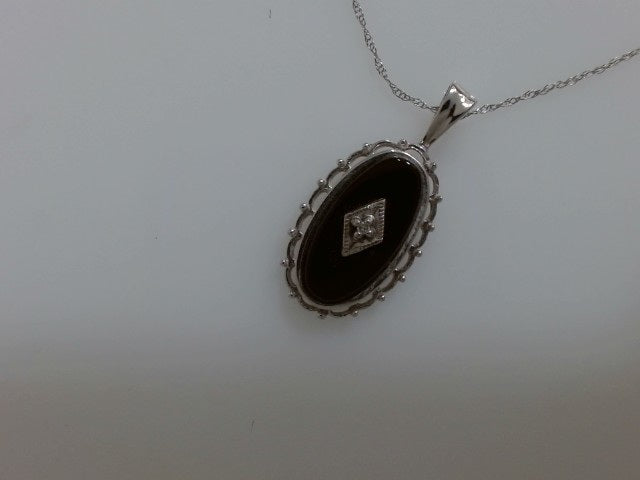 Lady's White 10 Karat Onyx/Dia