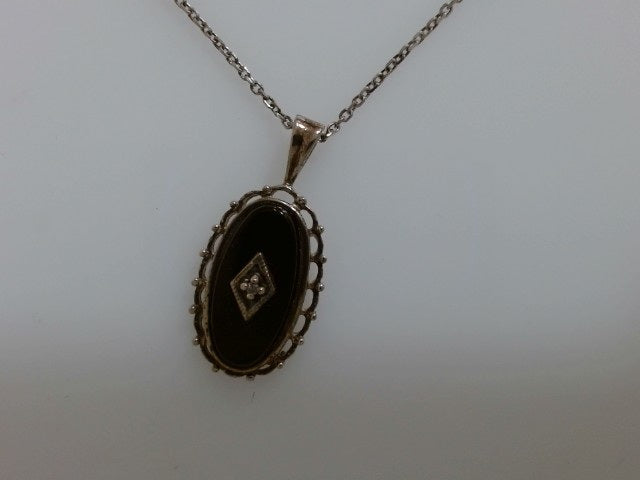 Lady's White Ss Onyx/Dia Drop